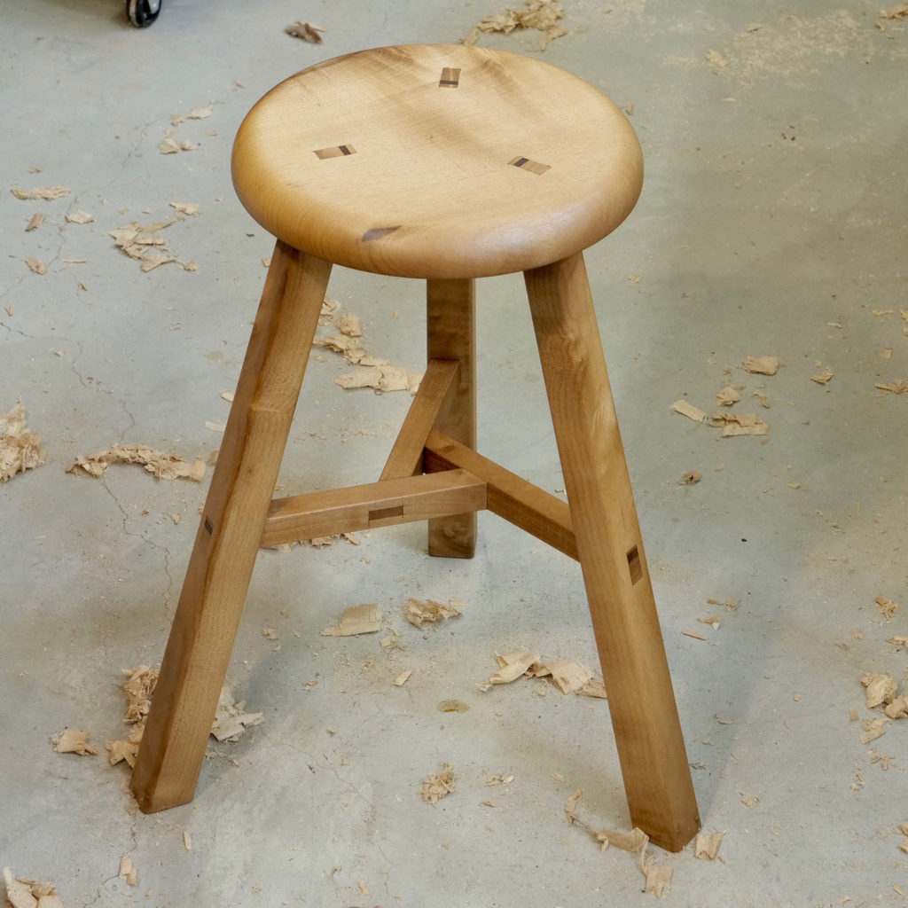 Three-legged dragon stool